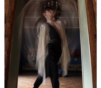 sample photo of a blurred person in a mirror taken with the canon r6 camera
