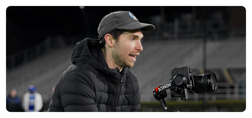 dji rs 4 being used to film an american footballer running across a field