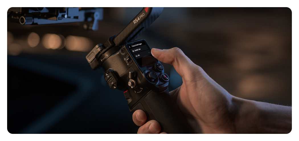 someone holding the DJI RS 4 Pro on set