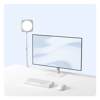 Clamp for Key Light Neo attached to a white desk