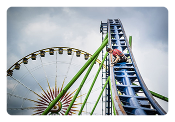 sample photo of someone repairing a roller coaster taken with the fujifilm 35mm 1.4 lens