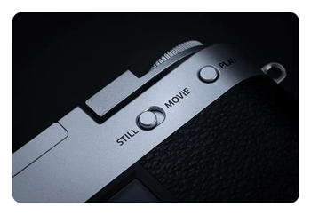close up of the Fujifilm X half video switch