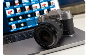 Fujifilm X-T50 sat on apple macbook with Frame.io open