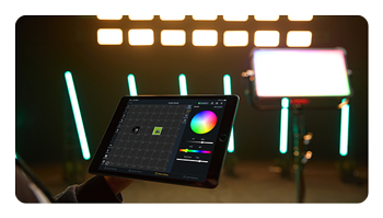 someone controlling the godox light using the app on a tablet