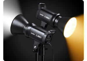 Two SL100Bi LED Lights facing away from each other illuminating daylight and tungsten light