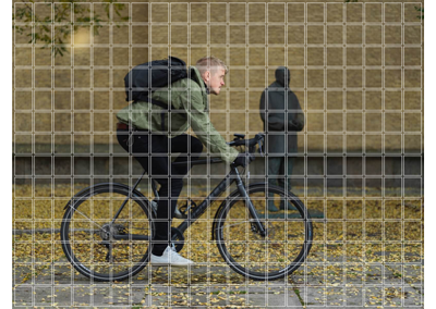 Hasselblad X2D Medium Format Camera Focus Grid overlayed over photo of man riding bicycle