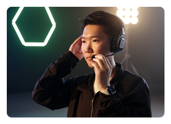 someone using the Hollyland Solidcom SE Pro headset in talk position