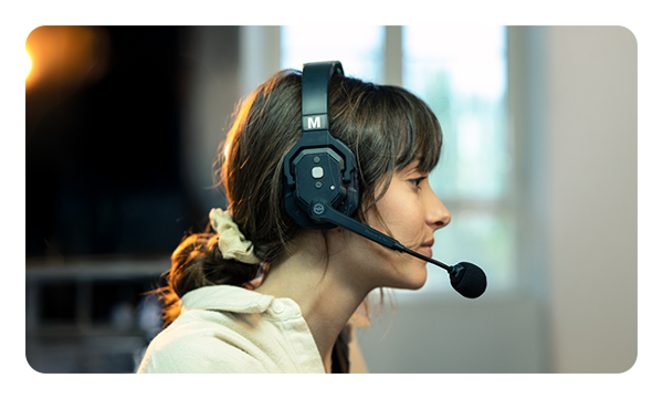 someone talking into the Hollyland Solidcom SE Pro headset