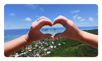sample image of someone making a love heart shape with their hands taken with the Insta360 Go 3S