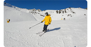 Insta360 X3 360 wide angle photo of skiier stopped on a snowy mountain