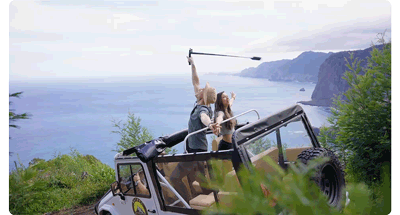 animated gif of two people standing in the back of a jeep using Insta 360 bullet time spin handle