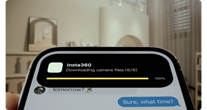 close up photo of iphone with insta360 footage downloading