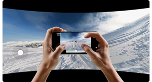 person holding smartphone reframing insta360 x4 footage
