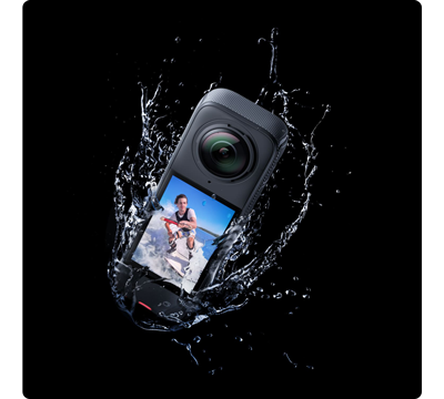 insta360 x4 with water splash on black background