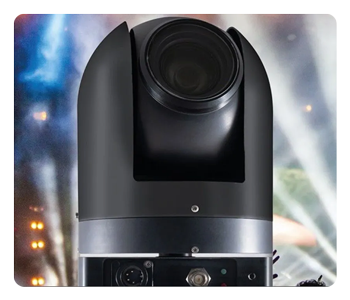 angled view of the mrmc 360 ptz camera with a live show in the background