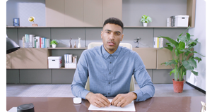 Person sitting at desk in modern home office