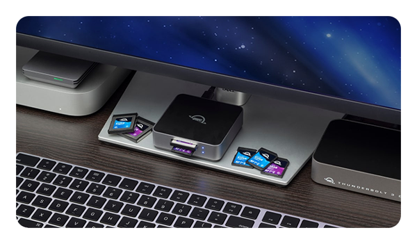 OWC Atlas Dual CFexpress + SD Card Reader on a desk connected to a pc