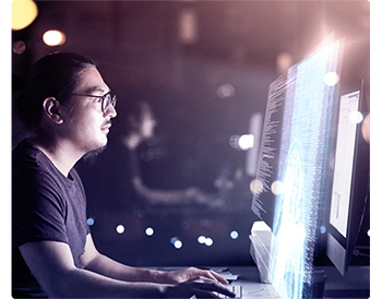 person working at computer monitor
