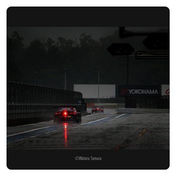 sample image taken on a racetrack on a rainy day taken with the panasonic lens