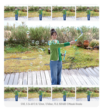 burst shooting example of a woman with a bubble wand taken using the Panasonic LUMIX S1IIE