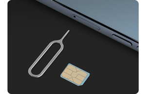 image of SIM eject pin and smartphone SIM card slot on side of smartphone
