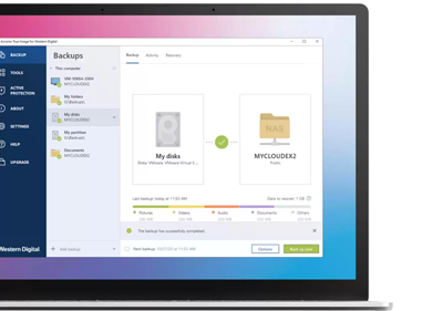windows laptop with Acronis True Image Backup software window open