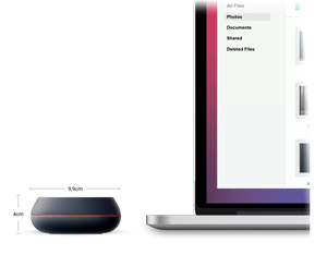 SanDisk Desk Drive sat next to an apple macbook with dimensions