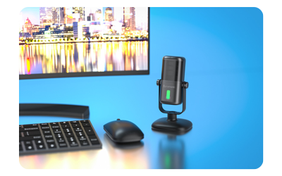 Saramonic SR-MV2000 on a desk with a computer monitor, keyboard and mouse on a reflective blue background