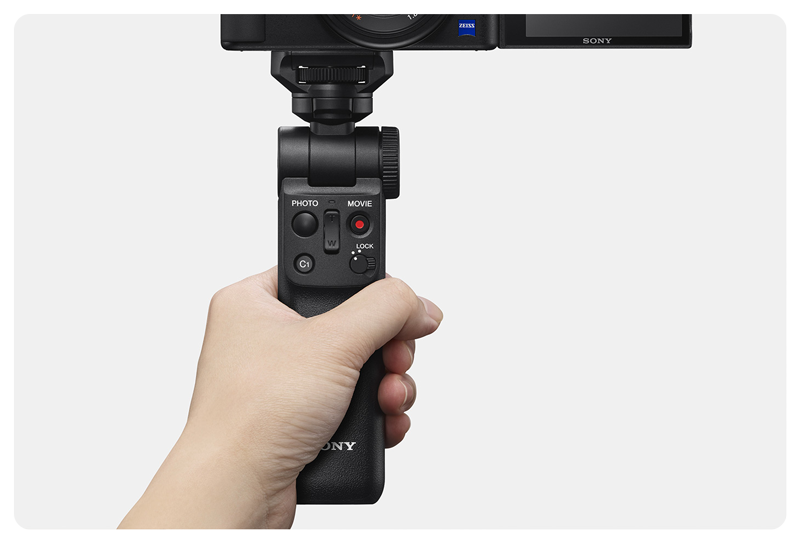Sony ZV-1 mounted to handheld tripod
