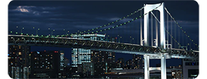 photograph of brooklyn bridge at night light by street lights