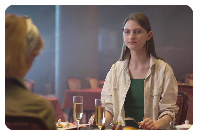 Sony FX30 sample image of two women sat at a table with glasses of champagne