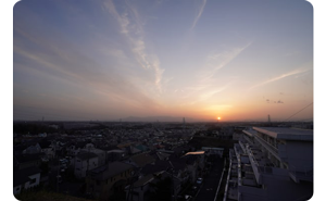 4K HDR landscape photography of a bright sunset across a city