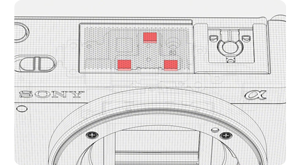 outline graphic top view of Sony ZV-E10 with microphones highlighted in red