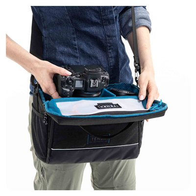 someone open the tenba skyline shoulder bag away from their body