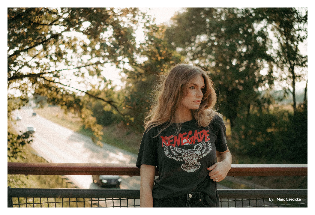 sample image of a woman on a bridge taken with the ttartisan af 35mm f1.8 lens