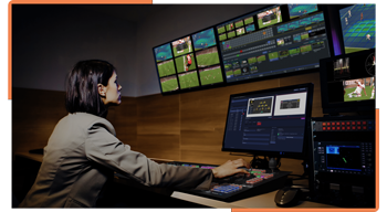 image showing female producer vizrt tricaster vizion to control sports broadcast