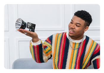 someone holding the molus g60 in one hand