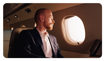 someone sat on a plane looking out the window with the zhiyun light mimicing sunlight