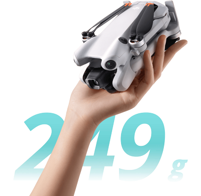 closed mini 4 pro drone being held by a hand with blue 249g text behind