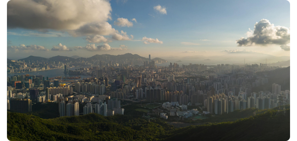 still photograph shot on mini 4 pro of a densely populated city scape with bright blue skies