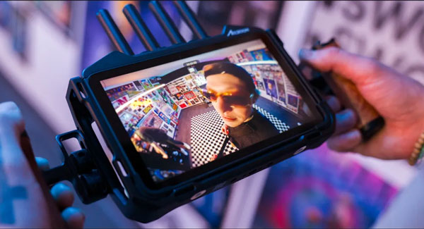 someone holding the accsoon cineview m7 pro