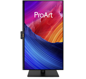ASUS ProArt pa27ucge standing vertically on desk