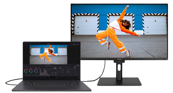 ASUS ProArt Laptop connected to monitor showing dancer wearing bright orange clothing