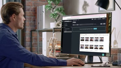 someone looking at footage taken with the ninja tx camera to cloud function
