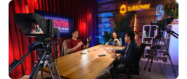 the blackmagic studio camera 4k pro g2 being used to film a podcast in a studio
