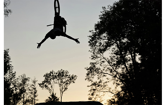 sample photo of a bmx rider upside down in mid air taken on the canon r5