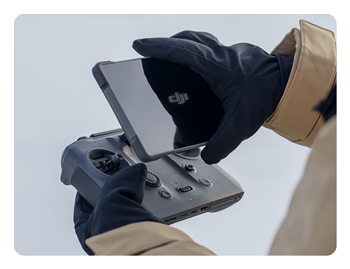 somone holding the DJI RC Pro 2 controller