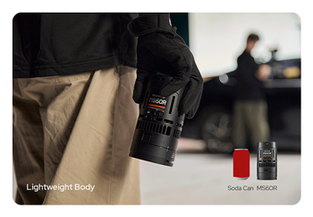 someone carrying the knowled led light with a size comparison to a can in thee corner