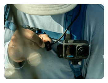someone wearing a gopro camera connected to the contacto