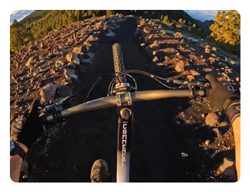 ultra-wide angle sample of someone riding a bike taken with the GoPro HERO12 Black
